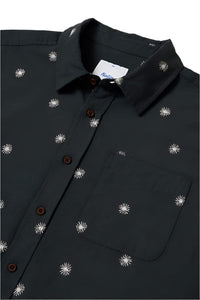 Close-up of black Shine Shirt with white sun graphic embroidery and chest pocket – breathable cotton linen men’s short sleeve button-up