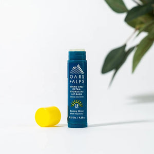 Oars+alps Spf lip balm 3pack in sunny mint flavor one tube with lid off