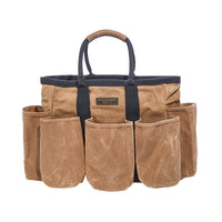 Readywares Supply Bag front view white background — 14 exterior waxed canvas pockets reinforced straps supported base utility tote