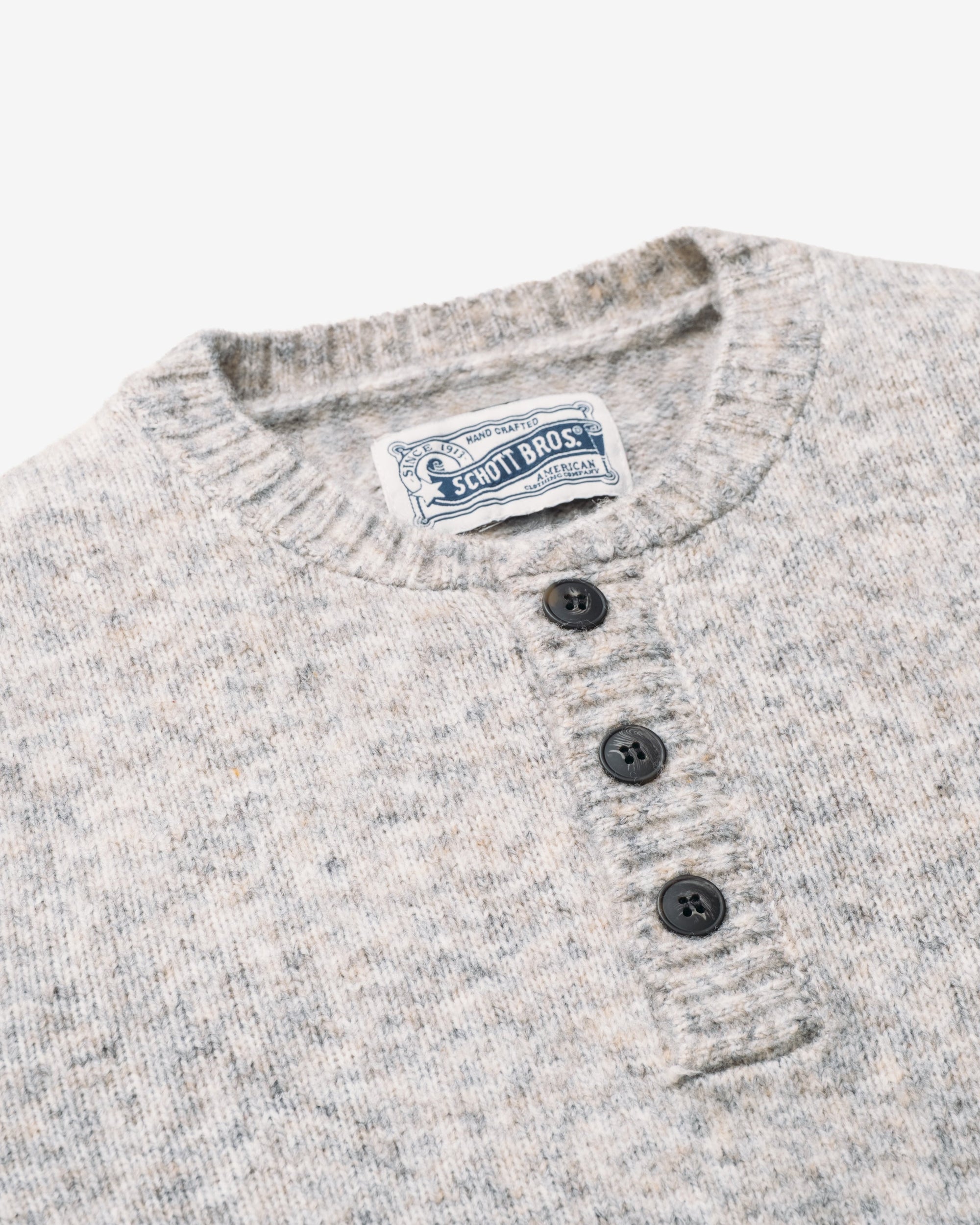 Close-up of the three-button henley placket and ribbed neckline on the Cloud Grey tri-blend sweater - The Simple Man