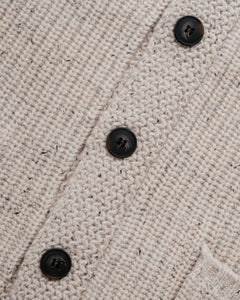 Shawl collar detail on an off white flecked Donegal wool blend cardigan - The Simple Man