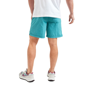 Model Wearing Howler Brothers Salado Shorts in Aqua, rear view