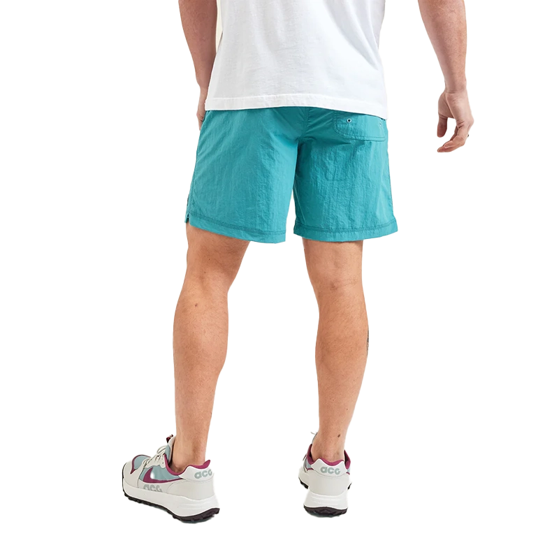 Model Wearing Howler Brothers Salado Shorts in Aqua, rear view