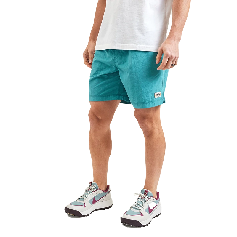 Model Wearing Howler Brothers Salado Shorts in Aqua, front view