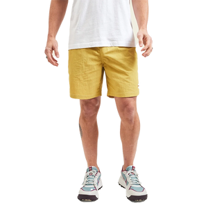 Model Wearing Howler Brothers Salado Shorts in Old Gold color, front  view
