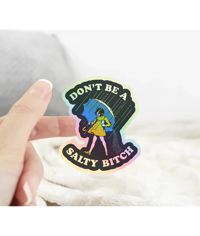 3-inch waterproof Don’t Be a Salty Bitch sticker shown in hand – durable holographic vinyl decal for men’s gear and gifts