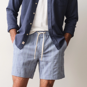 Marine Layer Saturday Beach Short 6 inch blue lifestyle shot on model showing 6 inch inseam length