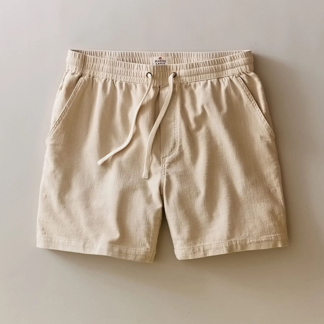 Marine Layer Saturday Beach Short 6 inch in sand front view