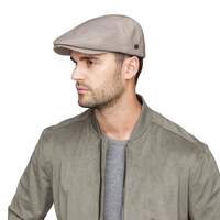 Bailey Slater Flat Cap Taupe – side profile on model wearing men's summer weight contour ivy cap with snap peak