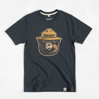 Smokey Bear Logo Tee in Dark Navy by The Landmark Project flat lay
