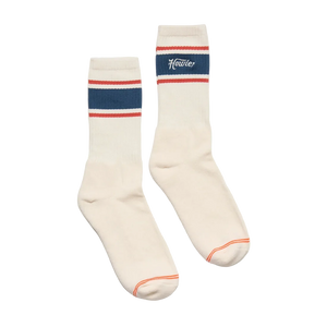 Howler Script Socks in White laid flat, cream crew socks with navy and red stripe and Howler script wordmark -- The Simple Man