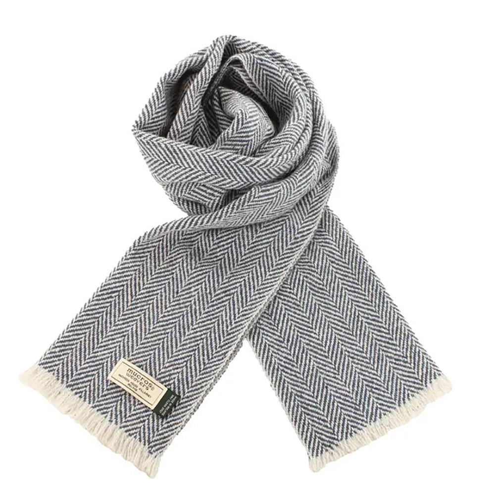 Light blue and white herringbone Donegal wool scarf with fringe ends, highlighting the traditional Irish woven pattern