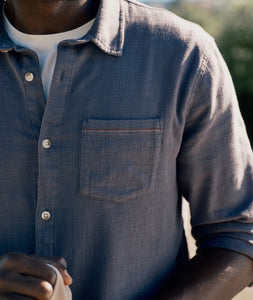 Close-up of men's stretch selvage shirt in India Ink with pocket detail