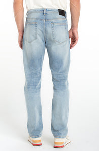 Back view of men’s light wash loose straight jeans with classic pockets