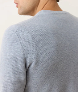 Close-up of men's Misty Heather sweater tee showing knit texture and shoulder seam detail