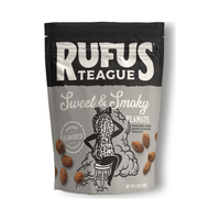 Front of the 9oz Sweet & Smoky peanuts pouch in gray and black with a peanut character on a stool
