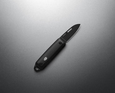 The James Brand Elko Black + Black EDC knife -- all-black machined aluminum handle and blade angle view keychain pocket knife