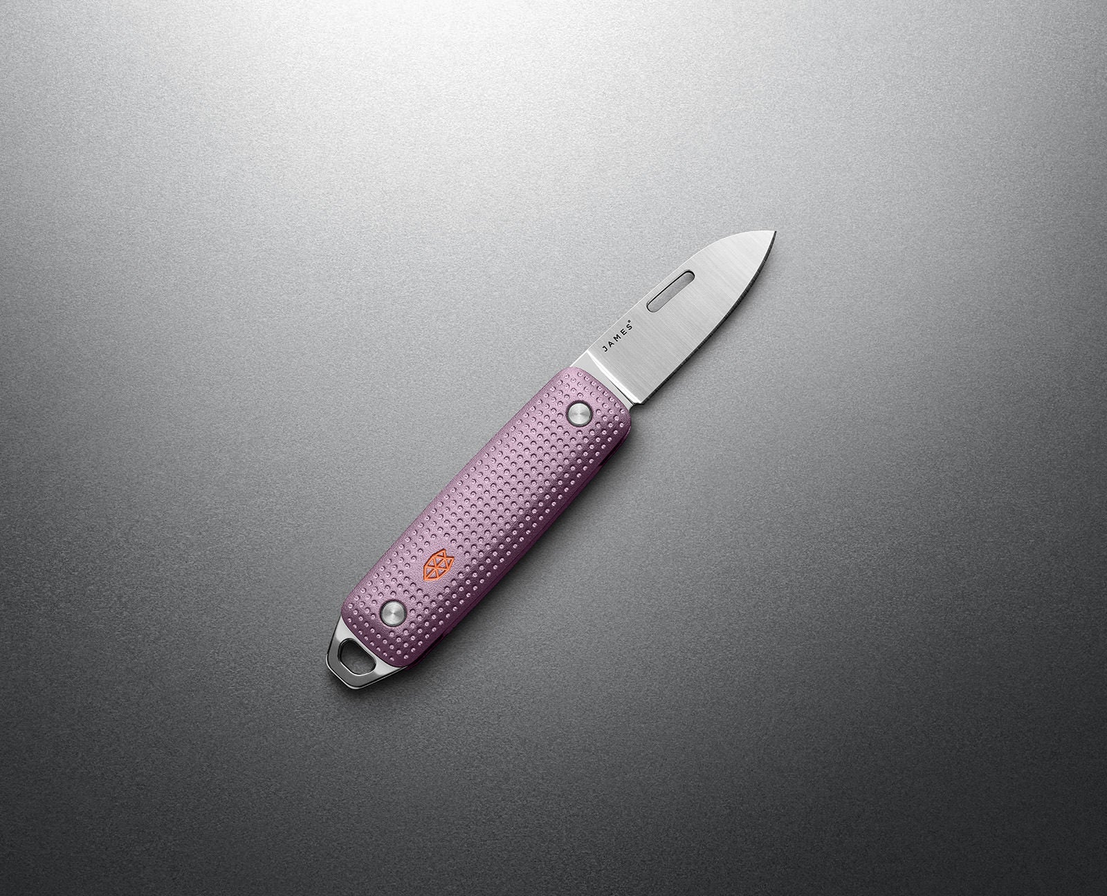 The James Brand Elko Pink Haze EDC knife -- pink machined aluminum handle stainless blade angle view keychain pocket knife