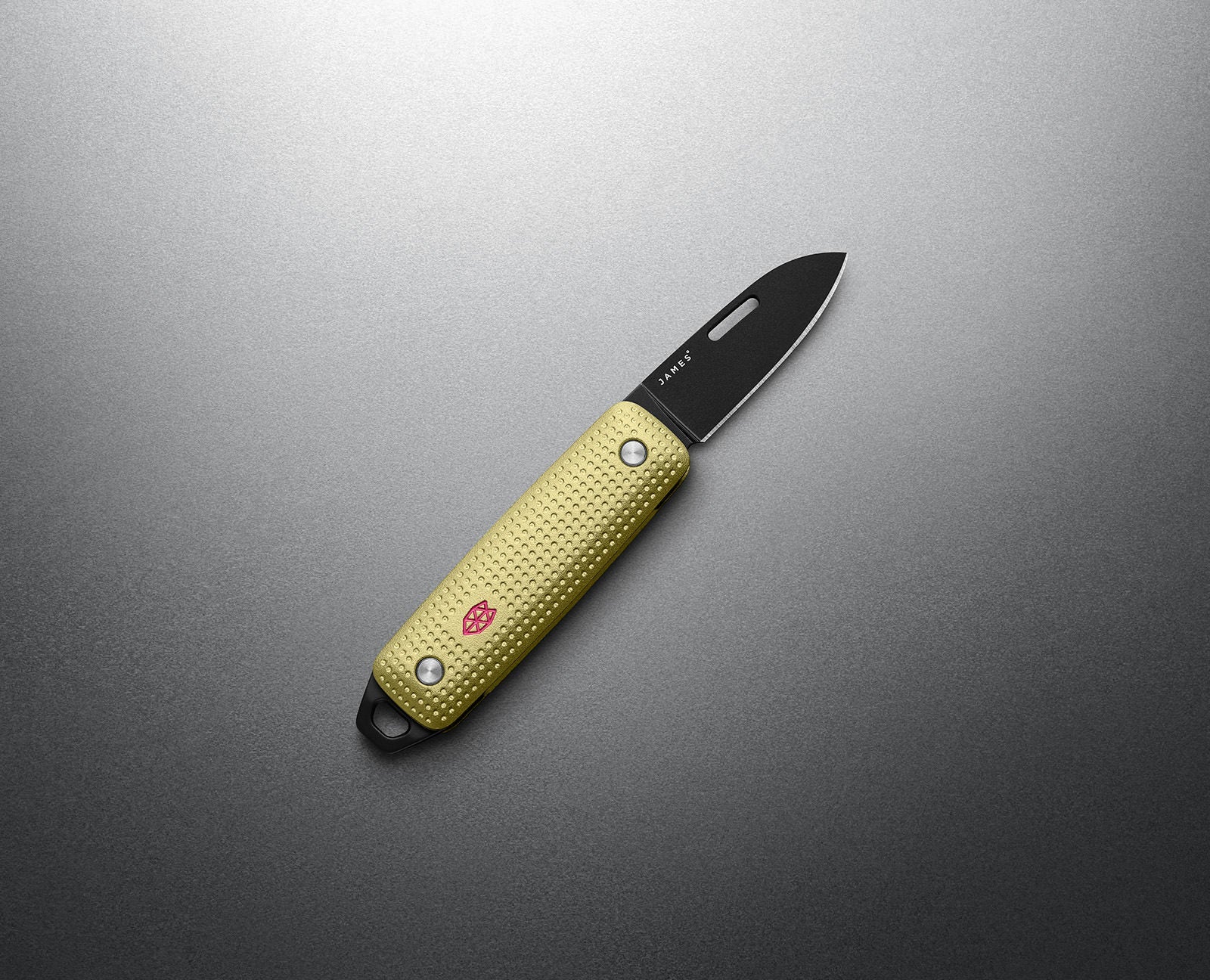 The James Brand Elko Butter + Black EDC knife -- butter yellow handle black blade angle view keychain pocket knife