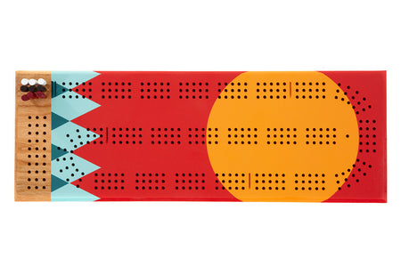 top view of Tettegouche cribbage board with hand-painted red, teal, and yellow design and included pegs.