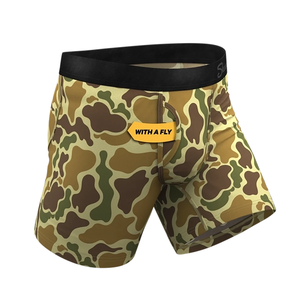 Side angle of duck camouflage boxer briefs featuring fly access
