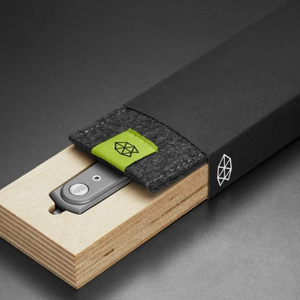Duval knife in its felt sleeve inside the black gift box, packaging view