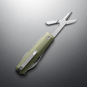 Grove + Stainless Helton with spring-action scissors open, angled view