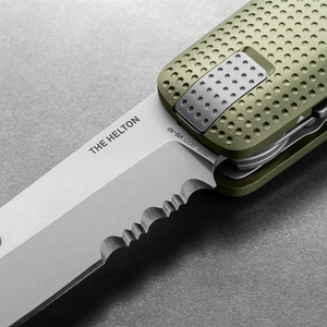 Close-up of the Helton's partially serrated blade and dot grip, Grove + Stainless
