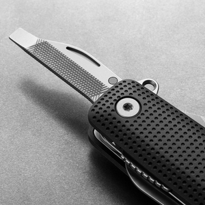 Helton in Black + Stainless with flathead driver and file tool extended, detail view