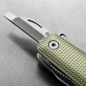 Helton in Grove + Stainless with flathead driver and file tool extended, detail view