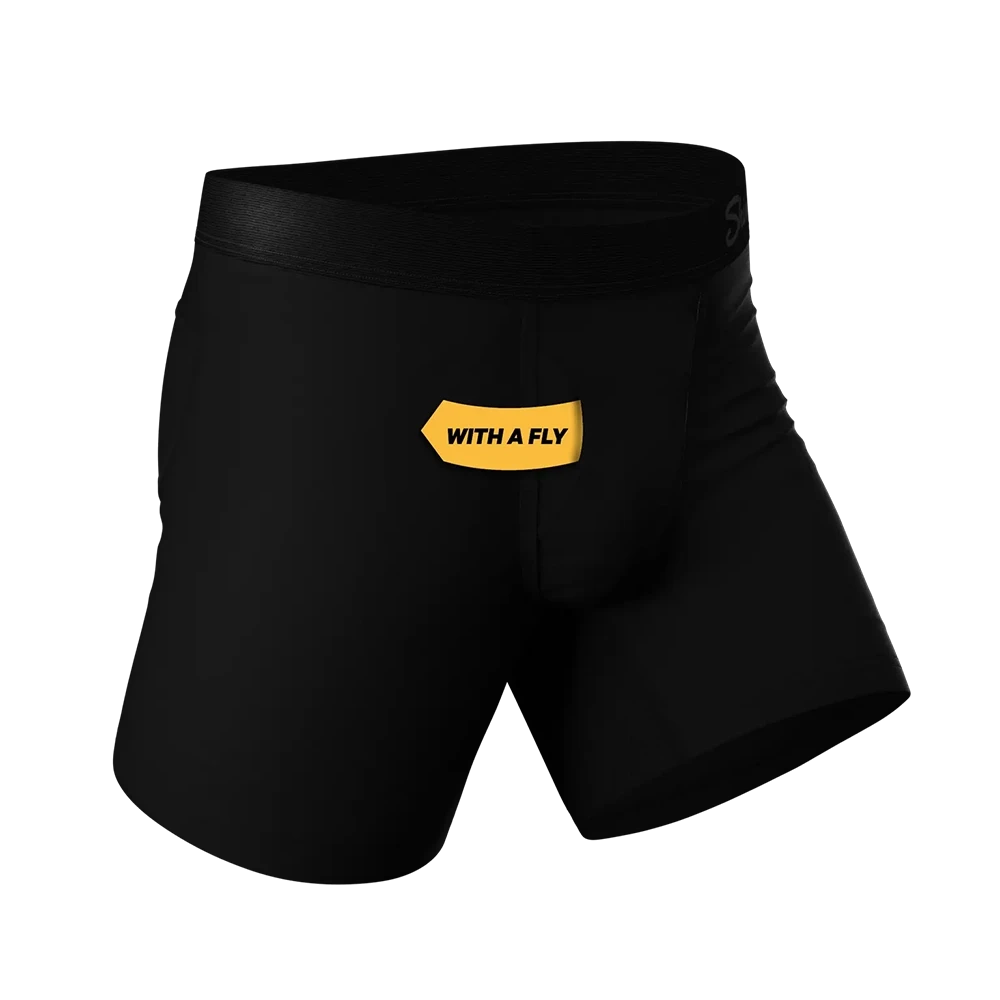 Side view of black Ball Hammock® pouch underwear highlighting moisture wicking, ultra support, super soft fabric, and anti-bunching fit