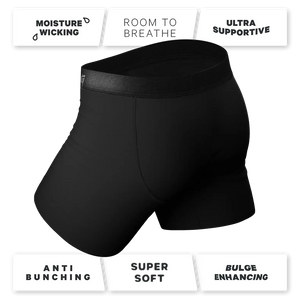 Angled view of black boxer briefs featuring quick-access fly and contoured fit for everyday wear