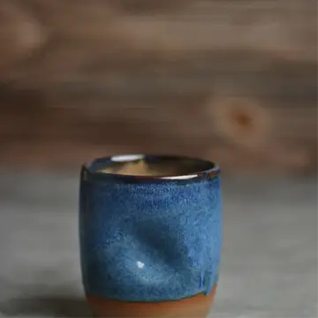 Jordan-Jean Ceramics handmade ceramic thumb cup in floating blue glaze