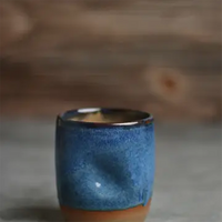 Jordan-Jean Ceramics handmade ceramic thumb cup in floating blue glaze