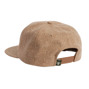 Back view of the Big HB Unstructured Snapback Hat in Cowhide, tan heather wool cap showing adjustable leather strap and monkey patch -- The Simple Man