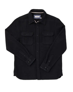 Black Houndstooth Flannel Utility Shirt from The Simple Man, laid flat showing double chest pockets.