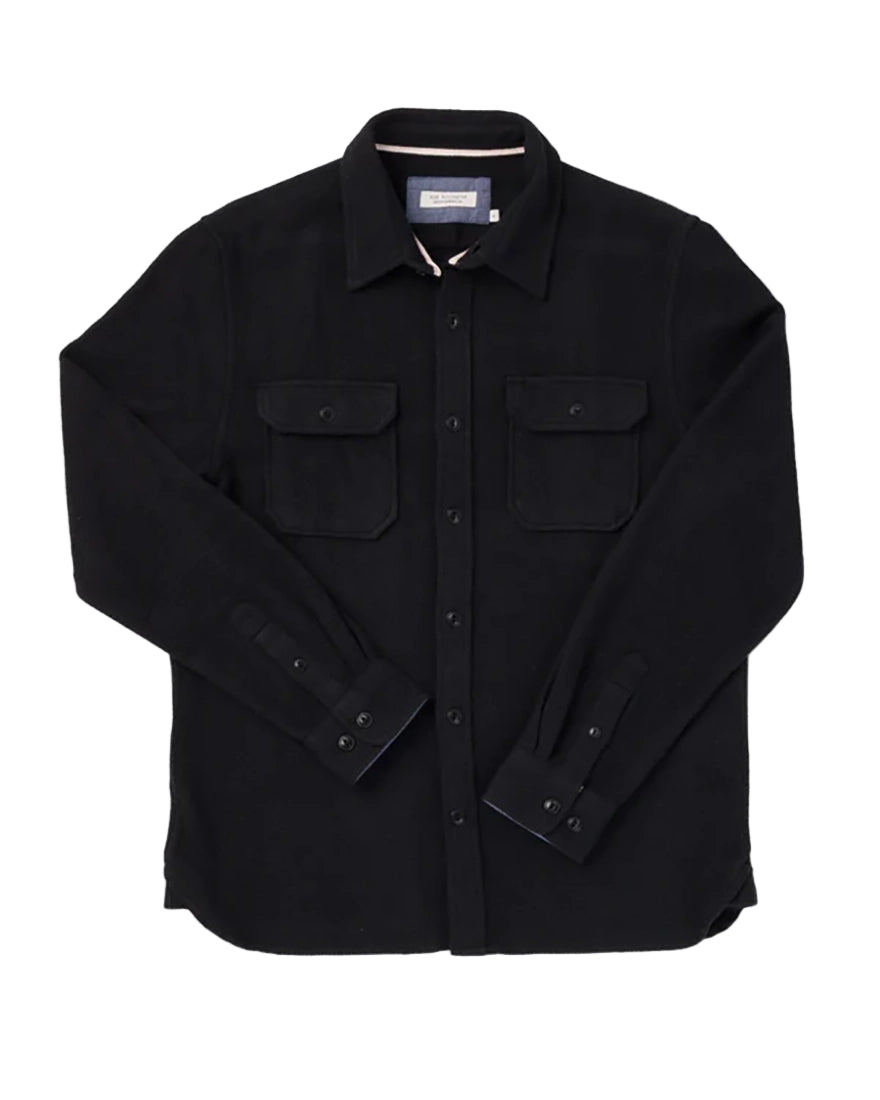 Black Houndstooth Flannel Utility Shirt from The Simple Man, laid flat showing double chest pockets.
