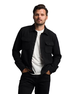 Man wearing black Houndstooth Flannel Utility Shirt from The Simple Man, front view casual style.