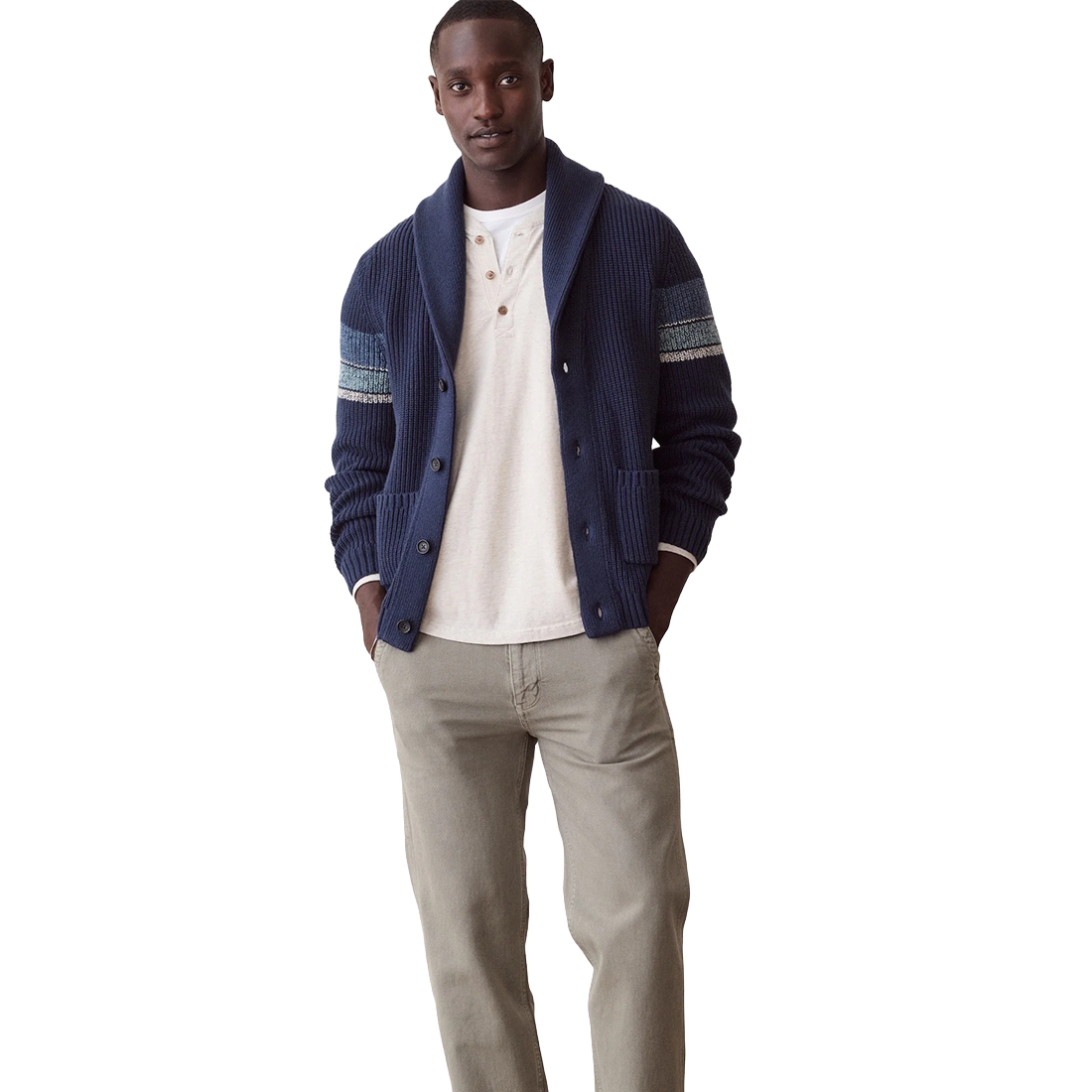 Man in the navy Varsity Shawl Cardigan over a cream henley with light chinos, full-length front view
