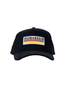 Front of black vintage corduroy hat with Iron & Resin embroidered patch logo
