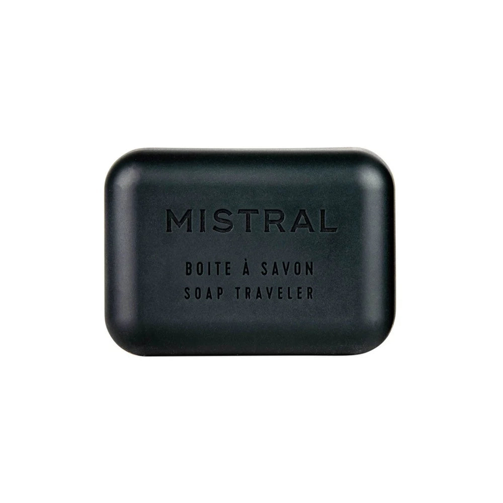 Black silicone soap travel case with Mistral logo, designed to store bar soap for travel and gym use