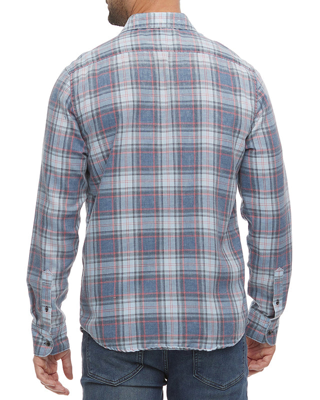 Model wearing Flag & Anthem Westley Long Sleeve shirt, in Navy/Light blue/coral plaid, rear view