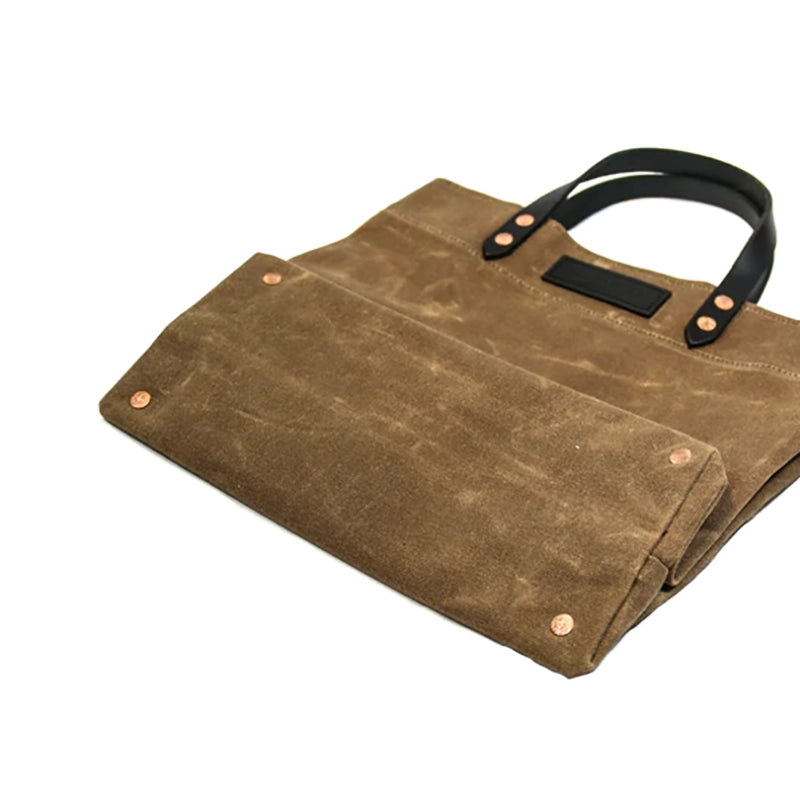 Hardmill waxed canvas grocery tote in tan, front folded view