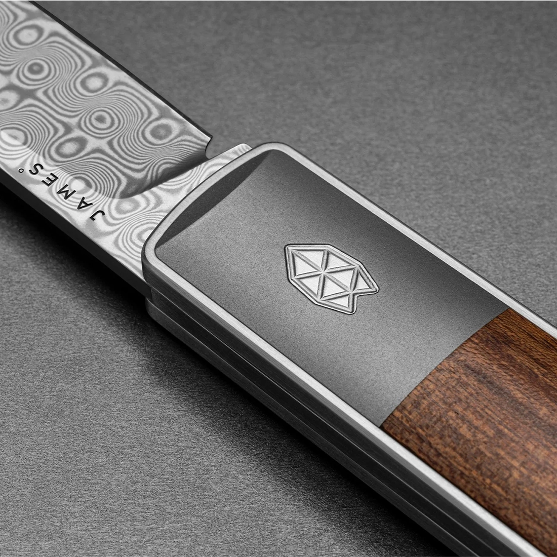 The James Brand Wayland slip joint knife half open showing sheepsfoot blade