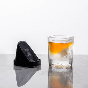Corkcicle Whiskey Wedge Glass showing silicone insert and ice in the glass