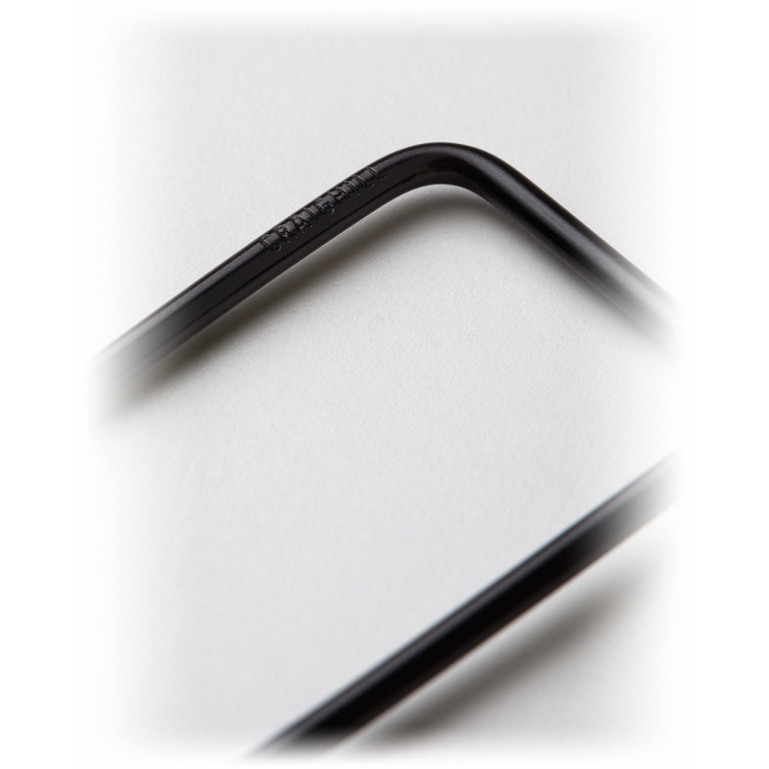Close-up of the black wire edge on a Wilson Keyring - The Simple Man