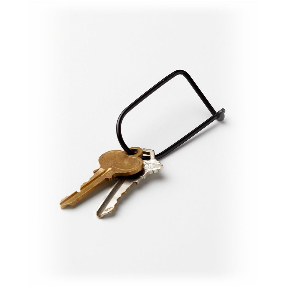 Black Wilson Keyring holding two keys - The Simple Man