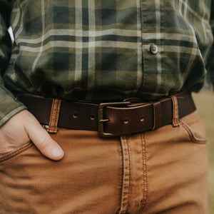 Man wearing Range Leather Co. Windom Belt in nut brown with flannel shirt and chinos – full grain leather men's belt