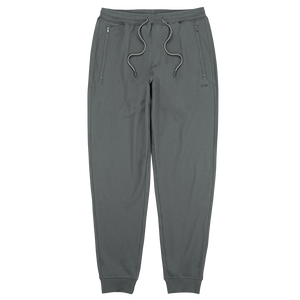 Woodland Jogger in Agave flat lay front view showing zip pockets and ribbed cuffs in green-grey tone - The Simple Man