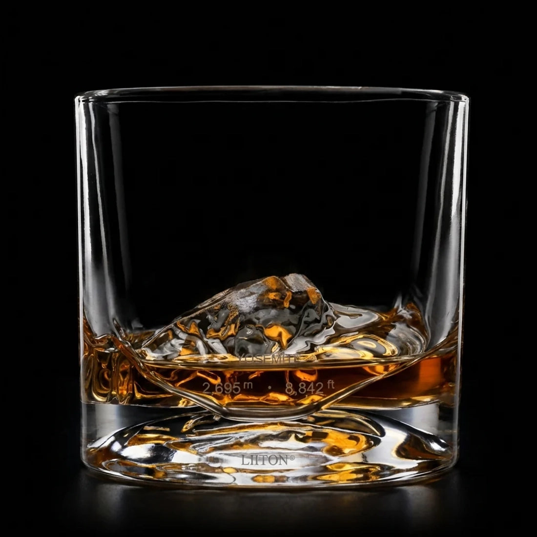 Set of two Yosemite Crystal Whiskey Glasses filled with whiskey side by side on black background - The Simple Man